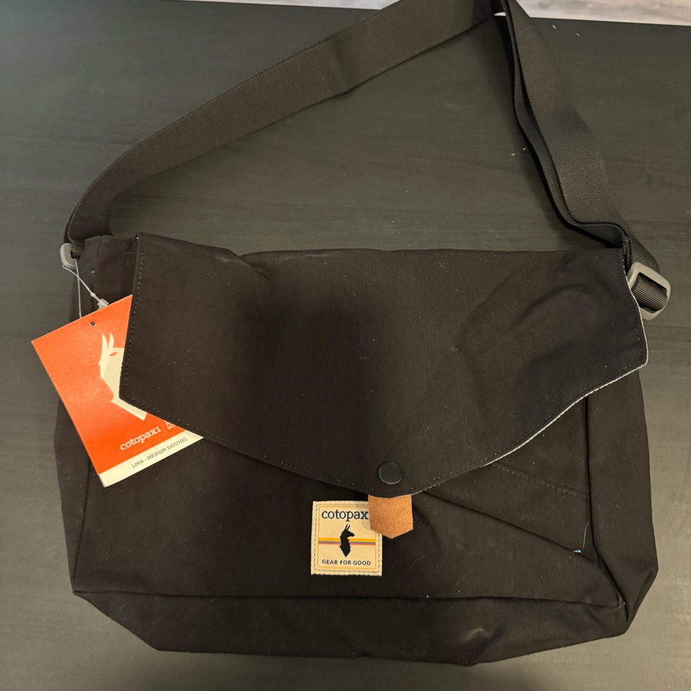 Cotopaxi messenger travel laptop bag
